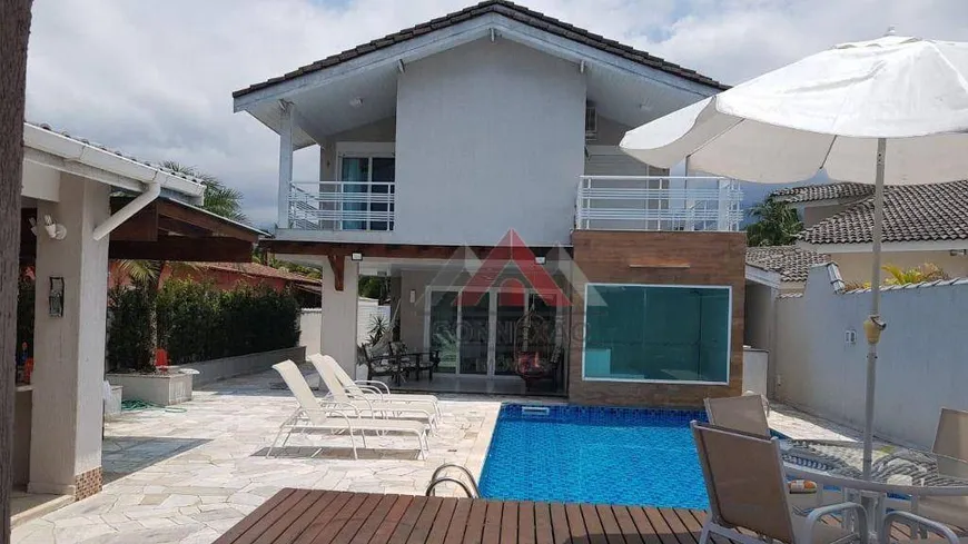 Foto 1 de Casa de Condomínio com 4 Quartos à venda, 330m² em Morada da Praia, Bertioga