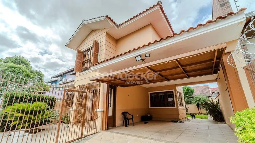 Foto 1 de Casa com 4 Quartos à venda, 250m² em Santa Fé, Porto Alegre