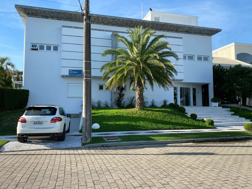 Foto 1 de Casa com 4 Quartos para venda ou aluguel, 1000m² em Jurerê Internacional, Florianópolis