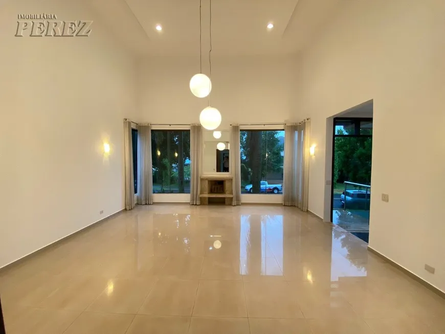 Foto 1 de Casa de Condomínio com 5 Quartos para venda ou aluguel, 530m² em Alphaville, Londrina