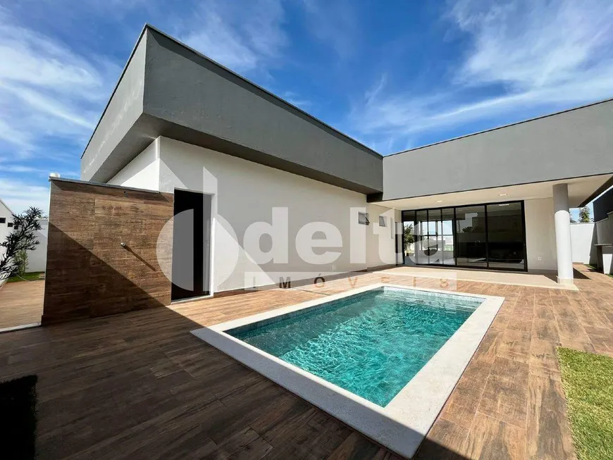 Foto 1 de Casa de Condomínio com 3 Quartos à venda, 216m² em Laranjeiras, Uberlândia