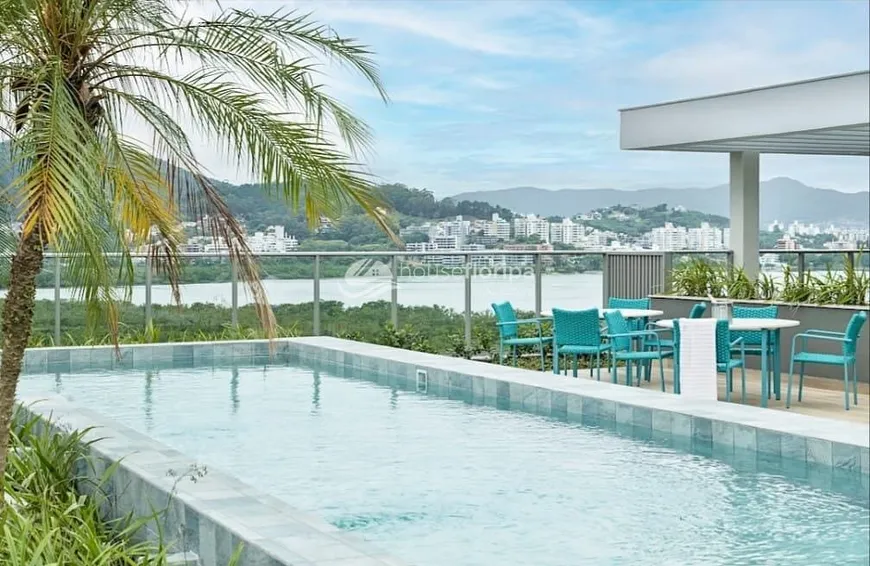 Foto 1 de Apartamento com 3 Quartos à venda, 121m² em Cacupé, Florianópolis