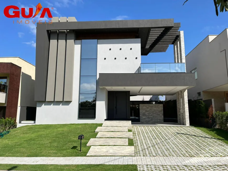 Foto 1 de Casa de Condomínio com 6 Quartos à venda, 433m² em Cararu, Eusébio