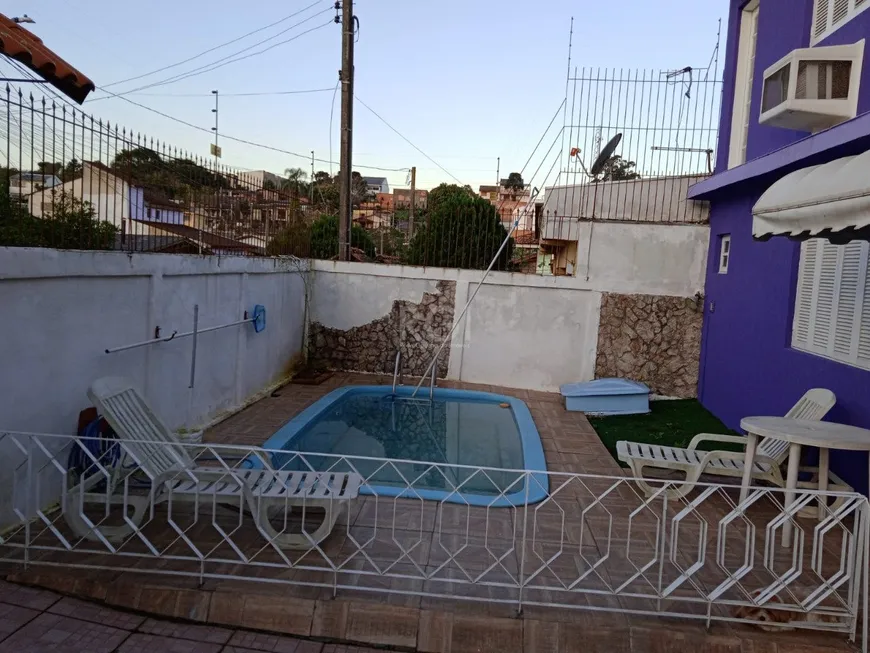 Foto 1 de Casa com 2 Quartos à venda, 101m² em Vila Nova, Porto Alegre
