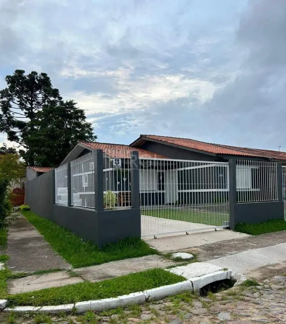 Foto 1 de Casa com 4 Quartos à venda, 71m² em Hípica, Porto Alegre