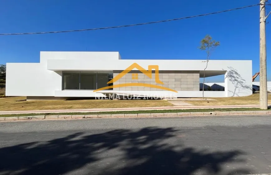 Foto 1 de Casa de Condomínio com 4 Quartos à venda, 400m² em Pimentas, Betim