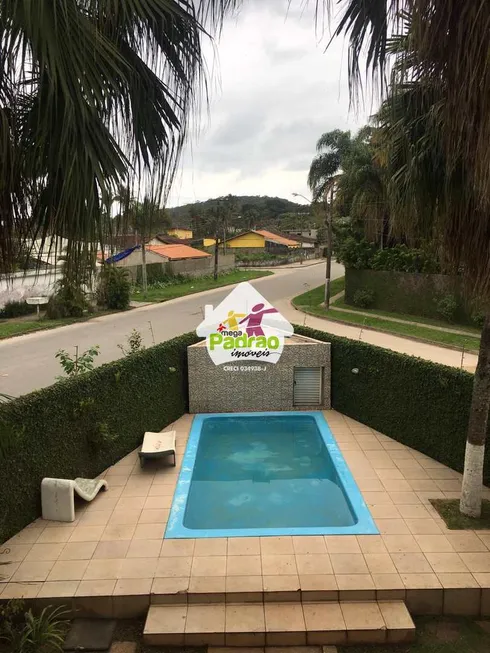 Foto 1 de Sobrado com 5 Quartos à venda, 500m² em Balneário Praia do Pernambuco, Guarujá