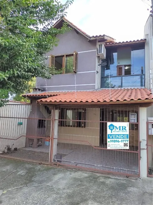 Foto 1 de Casa com 2 Quartos à venda, 76m² em Barnabe, Gravataí