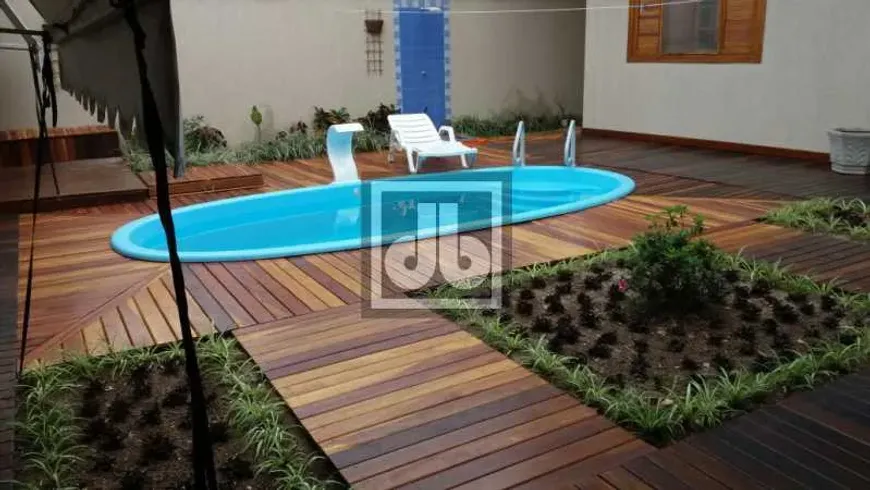 Foto 1 de Casa de Condomínio com 7 Quartos à venda, 402m² em Recreio Dos Bandeirantes, Rio de Janeiro