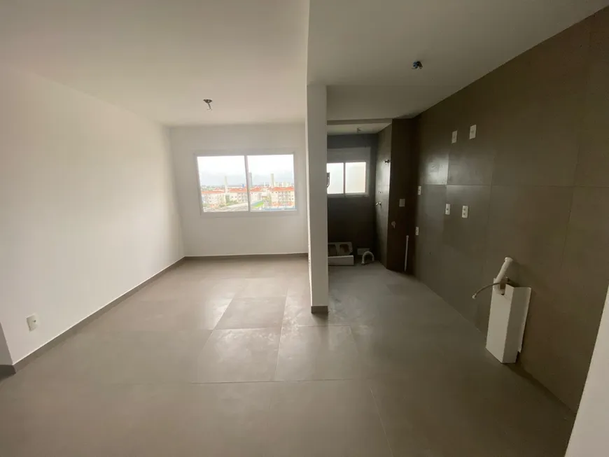 Foto 1 de Apartamento com 3 Quartos à venda, 66m² em Humaitá, Porto Alegre