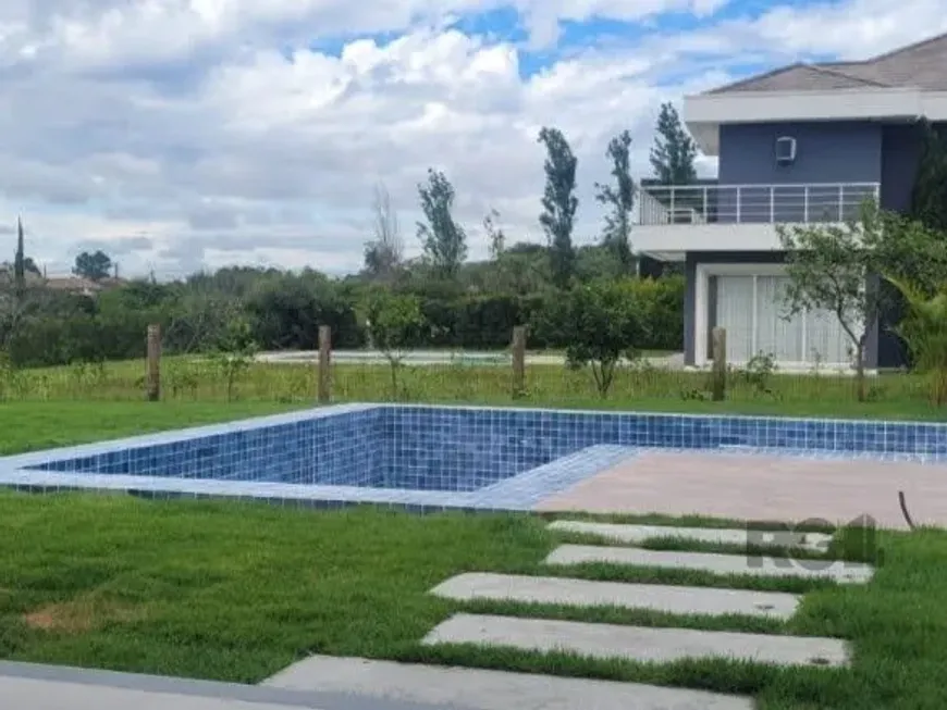 Foto 1 de Casa de Condomínio com 3 Quartos à venda, 371m² em Belém Novo, Porto Alegre