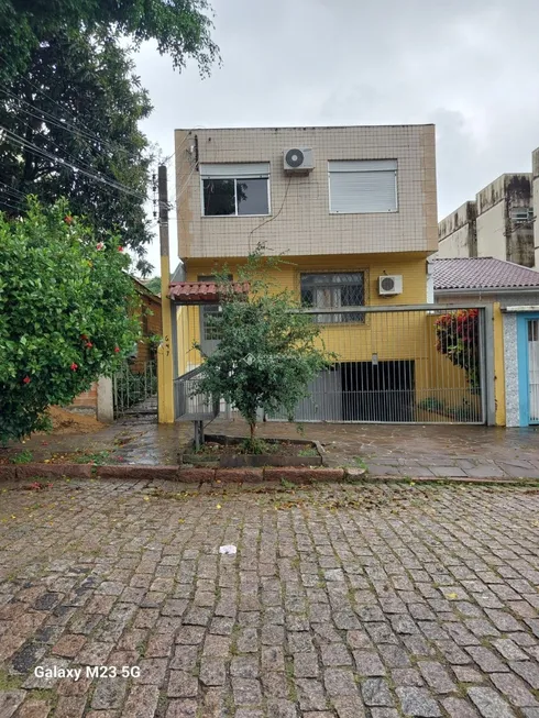 Foto 1 de Apartamento com 2 Quartos à venda, 60m² em Santo Antônio, Porto Alegre