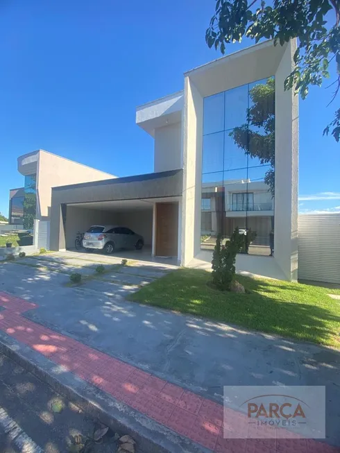 Foto 1 de Casa de Condomínio com 4 Quartos à venda, 228m² em Manguinhos, Serra