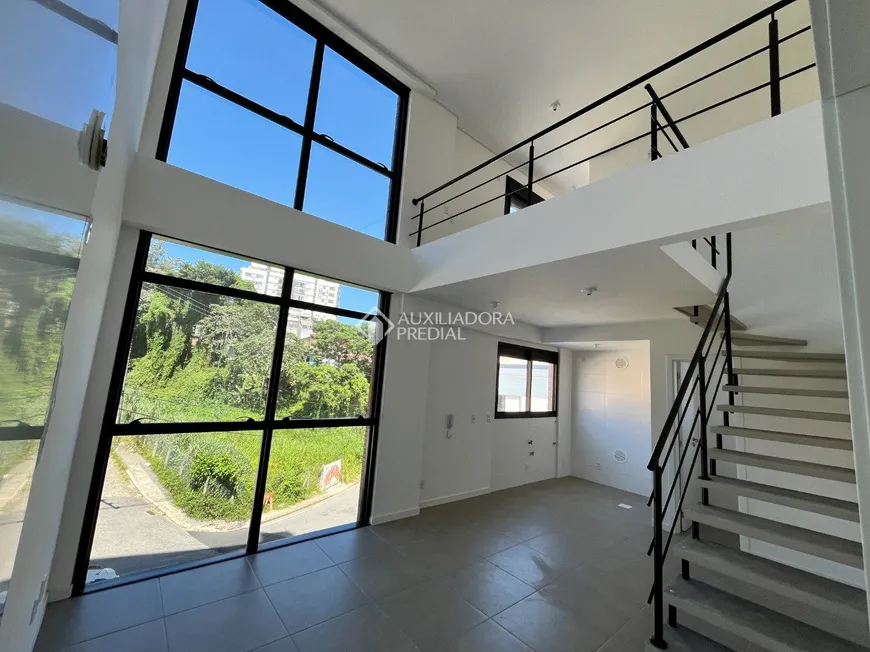 Foto 1 de Apartamento com 1 Quarto à venda, 42m² em Carvoeira, Florianópolis