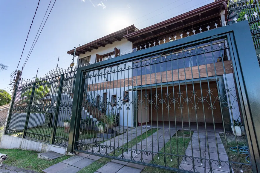 Foto 1 de Casa com 3 Quartos à venda, 292m² em Cavalhada, Porto Alegre