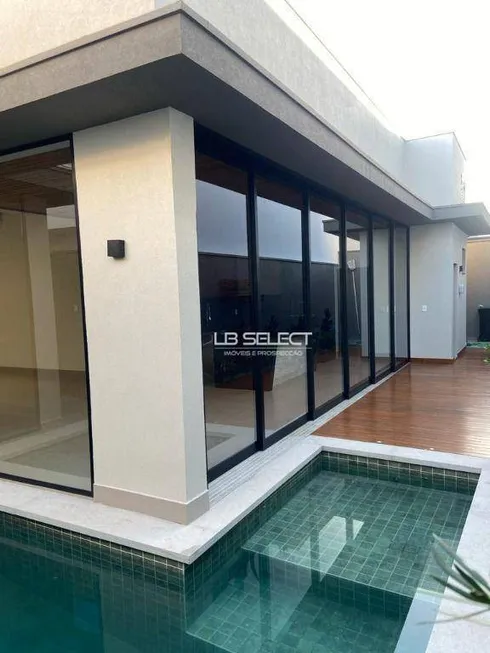 Foto 1 de Casa de Condomínio com 4 Quartos à venda, 260m² em Jardim Versailles, Uberlândia