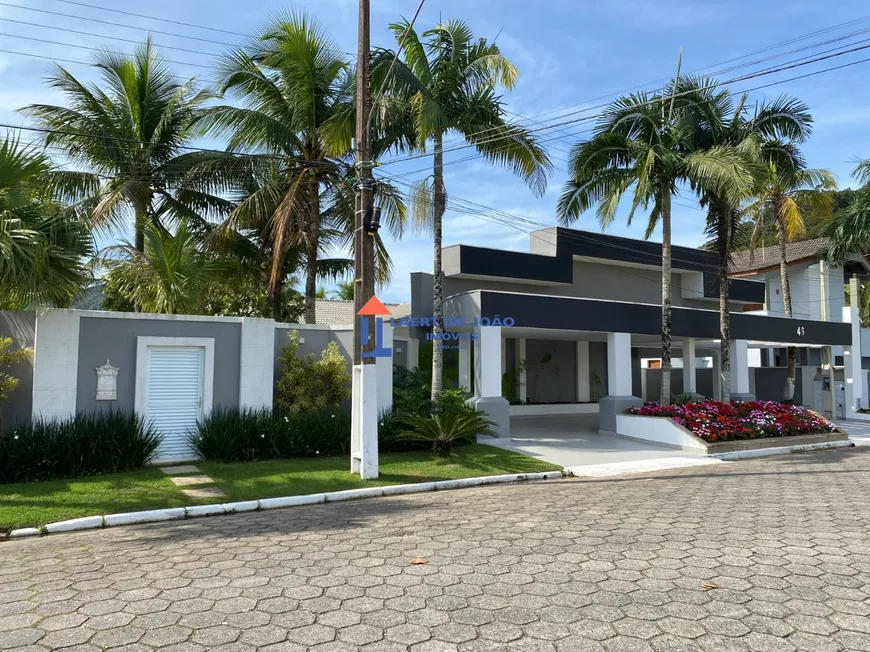 Foto 1 de Casa de Condomínio com 6 Quartos à venda, 500m² em Jardim Acapulco , Guarujá