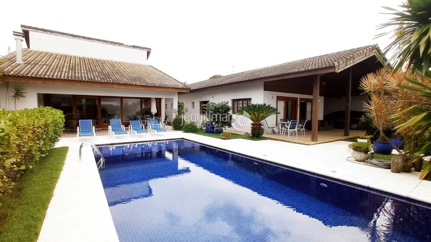 Foto 1 de Casa com 6 Quartos à venda, 480m² em Balneário Praia do Pernambuco, Guarujá