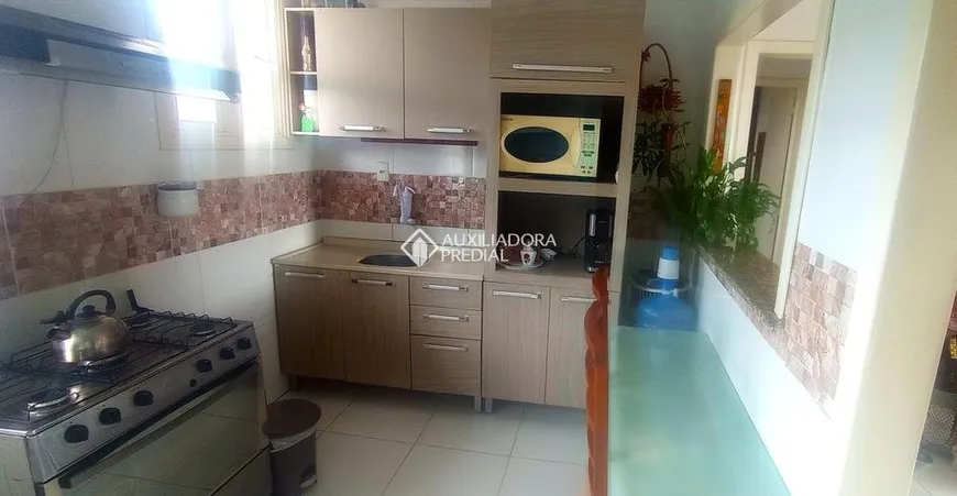 Foto 1 de Apartamento com 2 Quartos à venda, 52m² em Passo da Areia, Porto Alegre