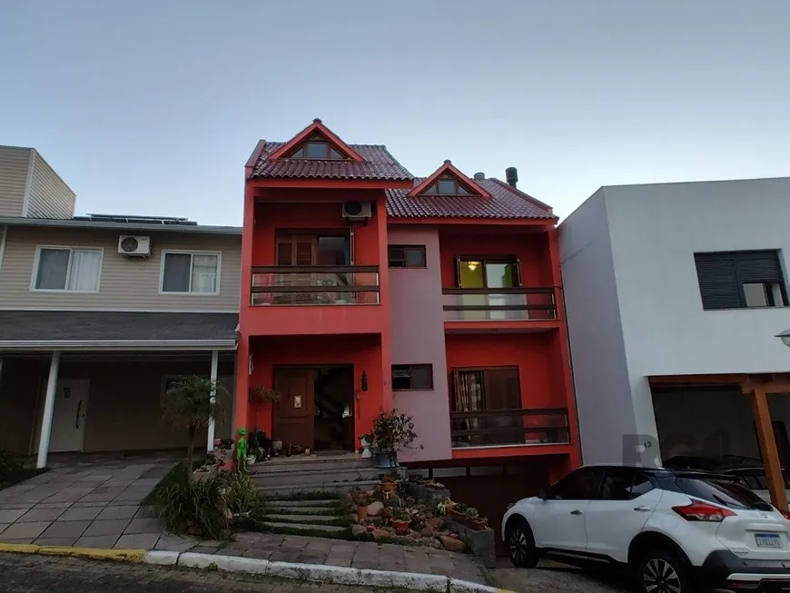 Foto 1 de Casa de Condomínio com 3 Quartos à venda, 339m² em Vila Nova, Porto Alegre