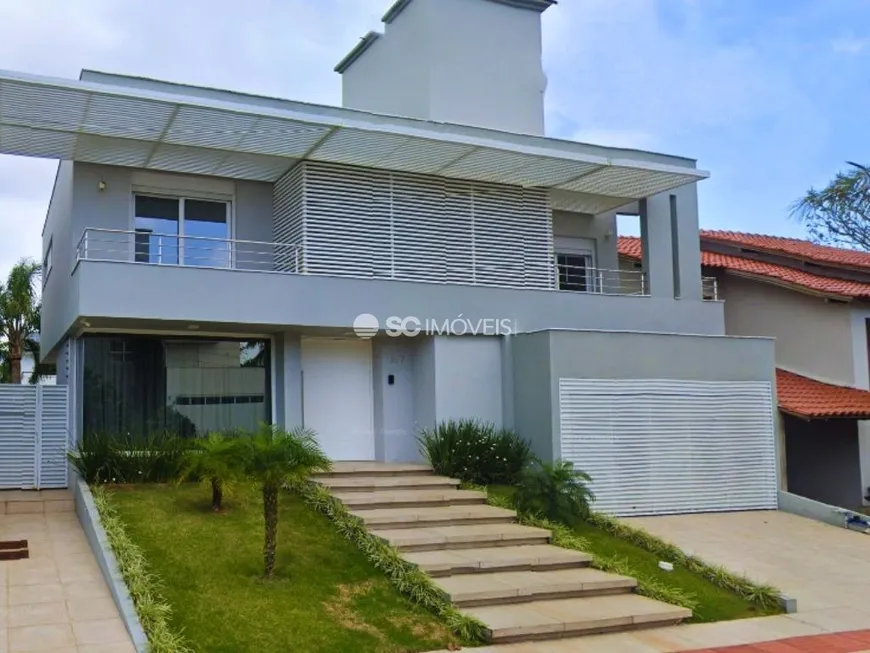 Foto 1 de Casa com 3 Quartos à venda, 420m² em Jurerê Internacional, Florianópolis