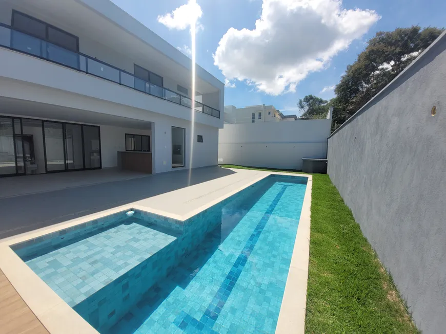 Foto 1 de Casa de Condomínio com 4 Quartos à venda, 420m² em Santo Antônio, Juiz de Fora