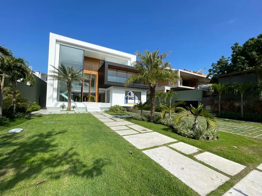 Foto 1 de Casa com 6 Quartos à venda, 1560m² em Barra da Tijuca, Rio de Janeiro