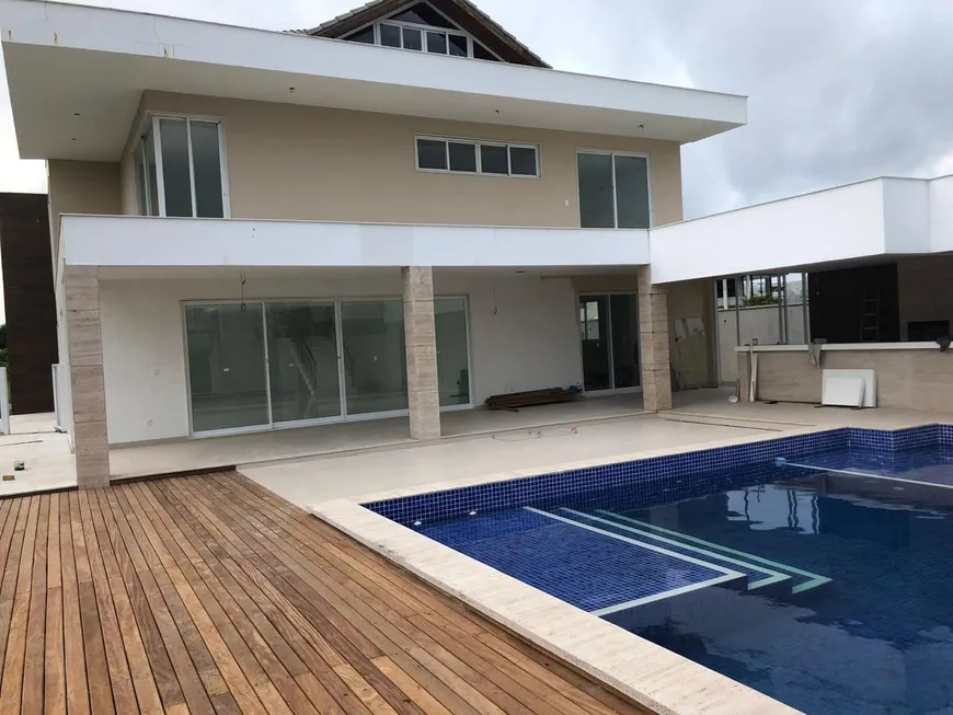 Foto 1 de Casa de Condomínio com 5 Quartos para venda ou aluguel, 1100m² em Barra da Tijuca, Rio de Janeiro