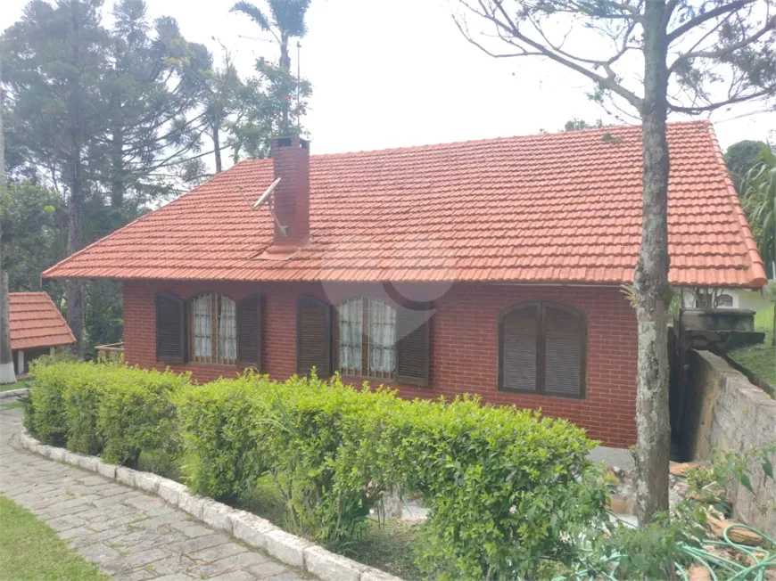 Foto 1 de Casa de Condomínio com 4 Quartos à venda, 435m² em Serra da Cantareira, Mairiporã