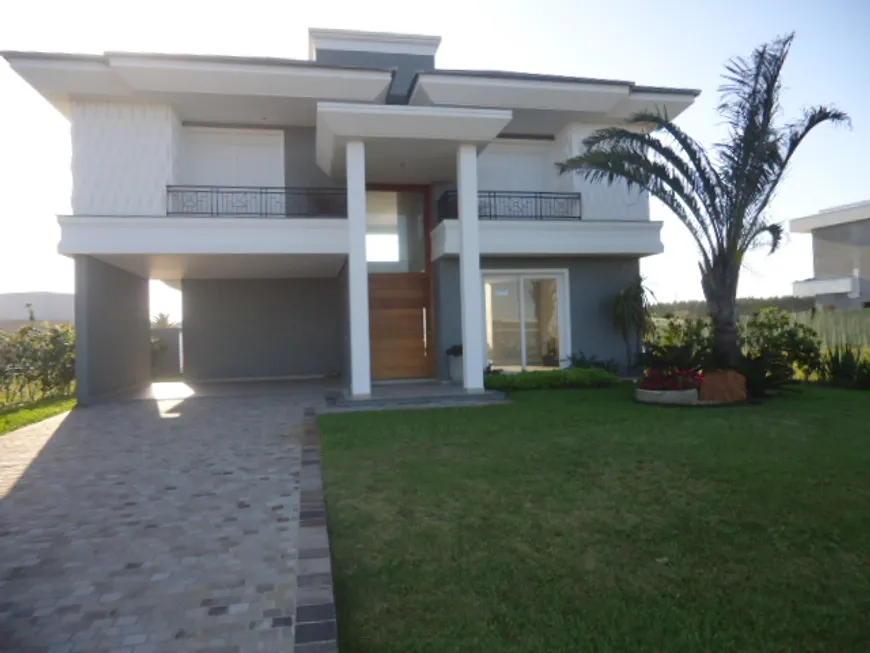 Foto 1 de Casa de Condomínio com 4 Quartos à venda, 300m² em Capao Novo, Capão da Canoa