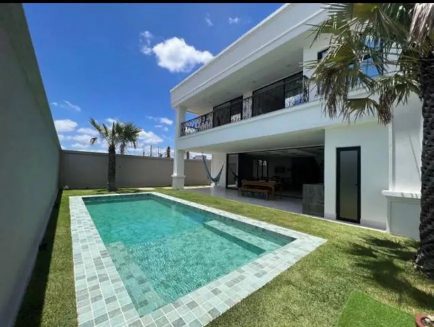 Foto 1 de Casa de Condomínio com 5 Quartos à venda, 350m² em Cidade Alpha, Eusébio