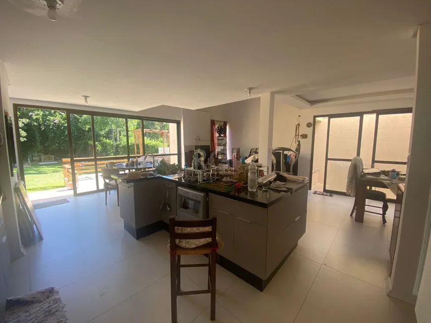 Foto 1 de Casa de Condomínio com 3 Quartos à venda, 299m² em Belém Novo, Porto Alegre