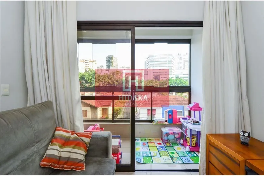 Foto 1 de Apartamento com 2 Quartos à venda, 64m² em Itaim Bibi, São Paulo