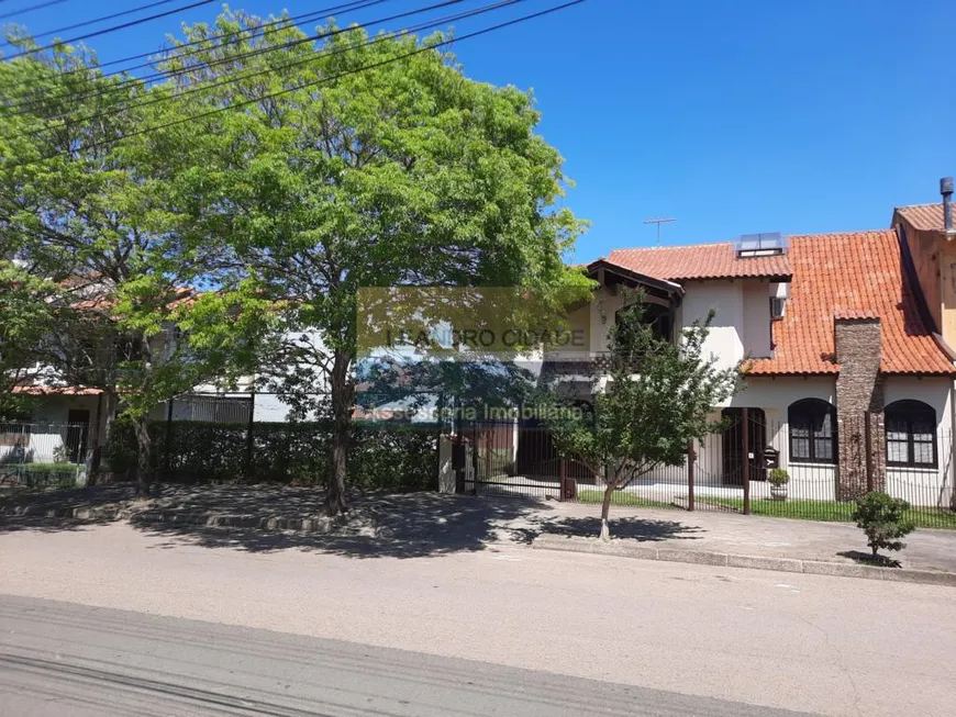 Foto 1 de Casa com 5 Quartos à venda, 287m² em Jardim Itú Sabará, Porto Alegre