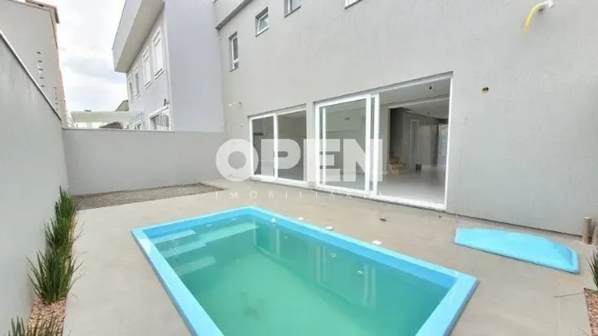 Foto 1 de Sobrado com 3 Quartos à venda, 225m² em Loteamento Moinhos de Vento, Canoas