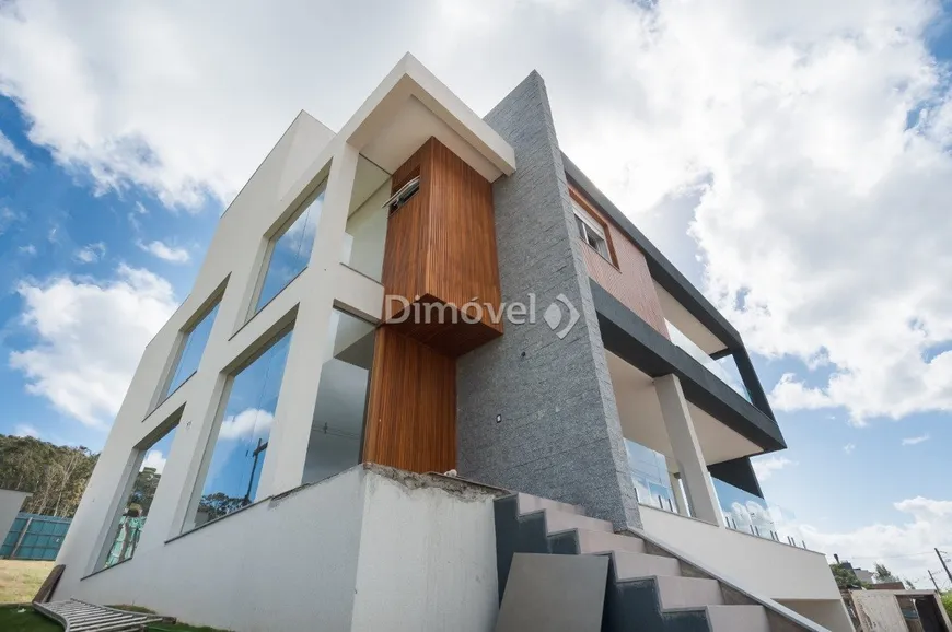 Foto 1 de Casa de Condomínio com 4 Quartos à venda, 357m² em Alphaville, Porto Alegre