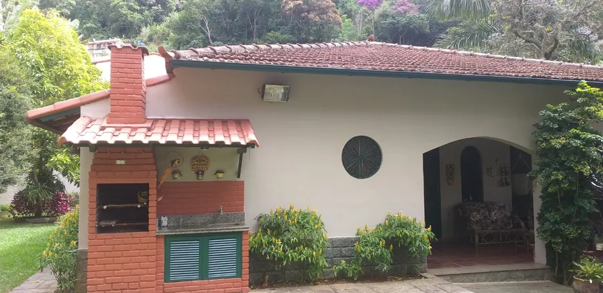 Foto 1 de Casa com 4 Quartos à venda, 150m² em Correas, Petrópolis