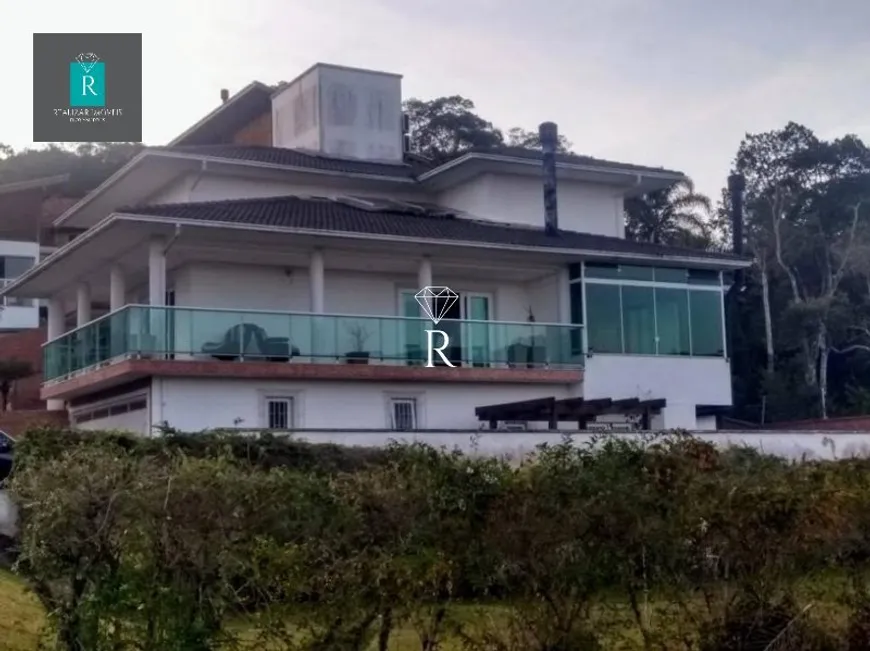 Foto 1 de Casa de Condomínio com 4 Quartos para alugar, 428m² em Cacupé, Florianópolis