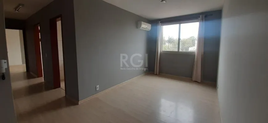 Foto 1 de Apartamento com 2 Quartos à venda, 59m² em Santa Fé, Porto Alegre