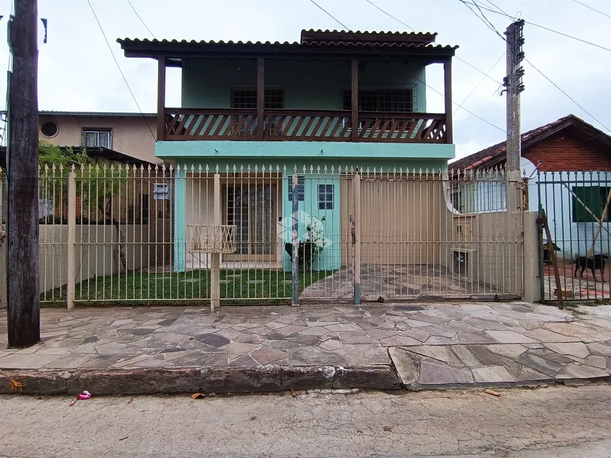 Foto 1 de Casa com 4 Quartos à venda, 148m² em Farrapos, Porto Alegre