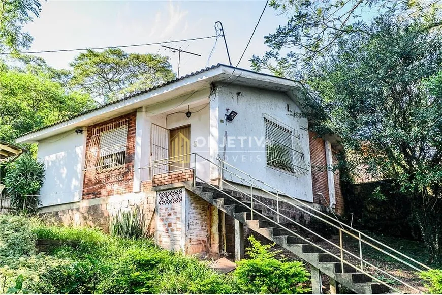 Foto 1 de Casa de Condomínio com 3 Quartos à venda, 67m² em Santa Tereza, Porto Alegre