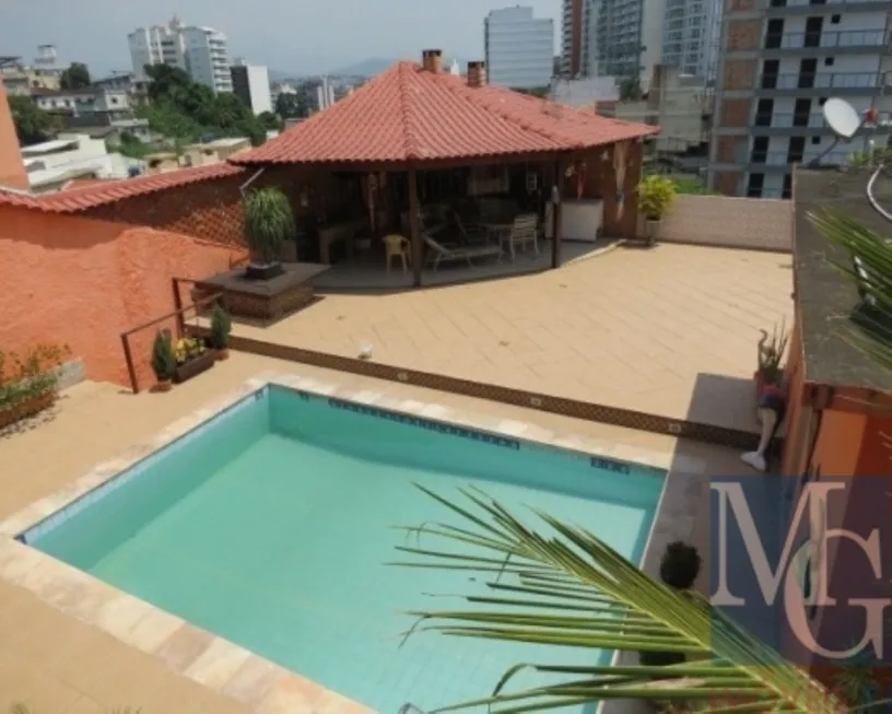 Foto 1 de Casa com 4 Quartos à venda, 139m² em Jardim Vinte e Cinco de Agosto, Duque de Caxias