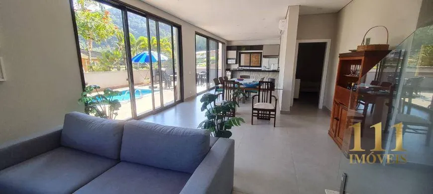 Foto 1 de Casa de Condomínio com 4 Quartos à venda, 230m² em Lagoinha, Ubatuba