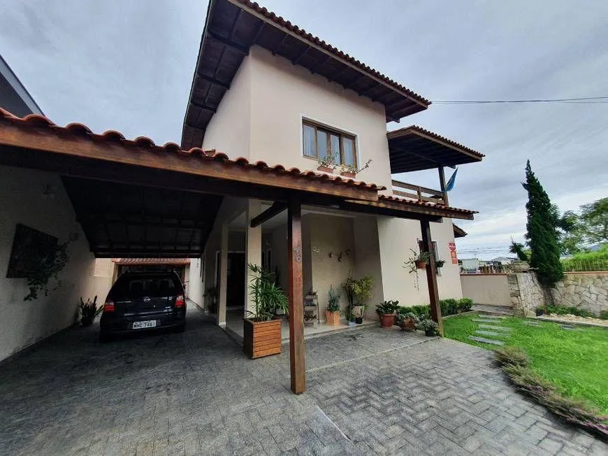 Foto 1 de Casa com 4 Quartos à venda, 345m² em Carianos, Florianópolis