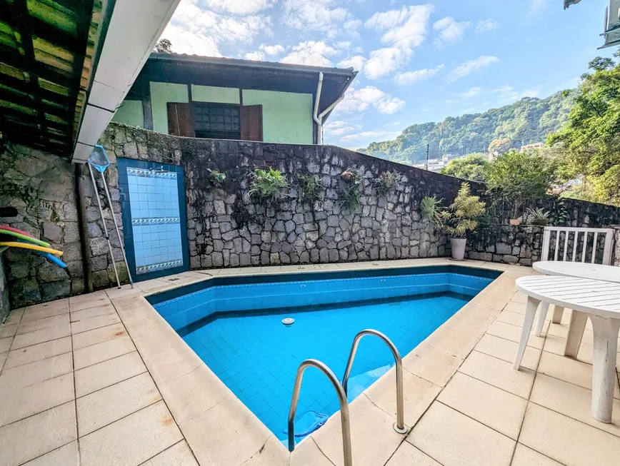 Foto 1 de Casa com 5 Quartos à venda, 380m² em Cosme Velho, Rio de Janeiro