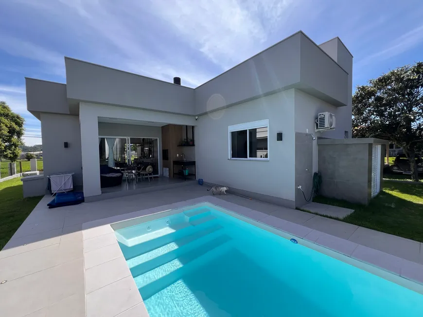 Foto 1 de Casa de Condomínio com 3 Quartos à venda, 130m² em Lagoa dos Esteves, Balneário Rincão