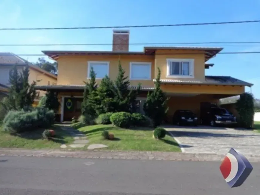 Foto 1 de Casa de Condomínio com 4 Quartos à venda, 453m² em Belém Novo, Porto Alegre