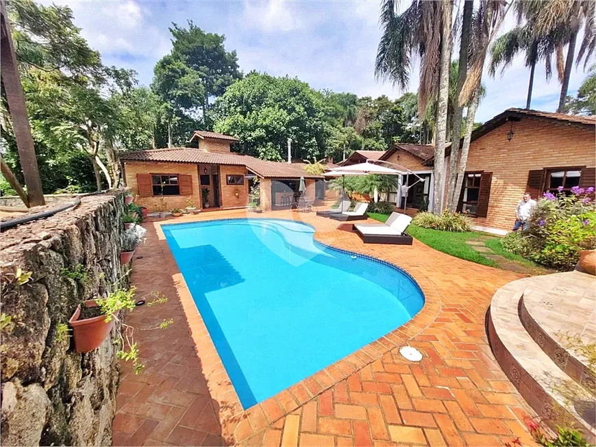 Foto 1 de Casa de Condomínio com 3 Quartos à venda, 370m² em Serra da Cantareira, Mairiporã