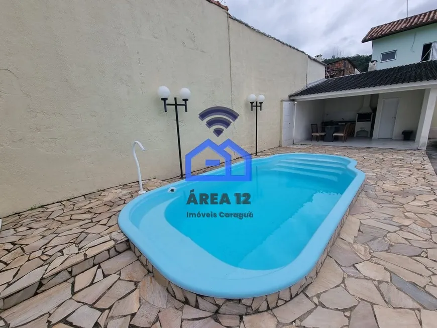 Foto 1 de Casa de Condomínio com 2 Quartos à venda, 88m² em Prainha, Caraguatatuba