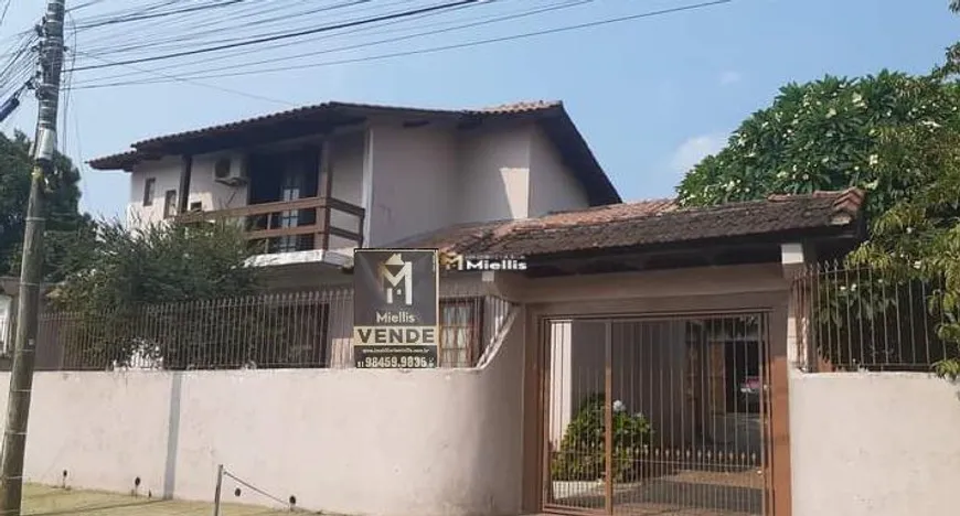 Foto 1 de Casa com 5 Quartos à venda, 158m² em Tarumã, Viamão